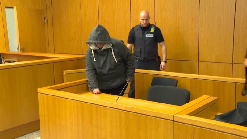 Man accused of drugging, sexually abusing his wife stands trial with 12 others