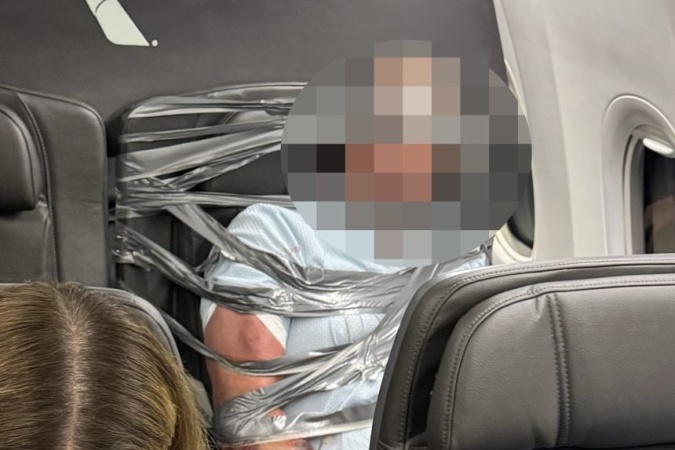 Disruptive passenger duct-taped to first-class seat as plane makes emergency landing