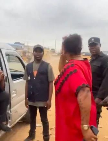 Woman stops police from taking boys away after phone search in Lagos
