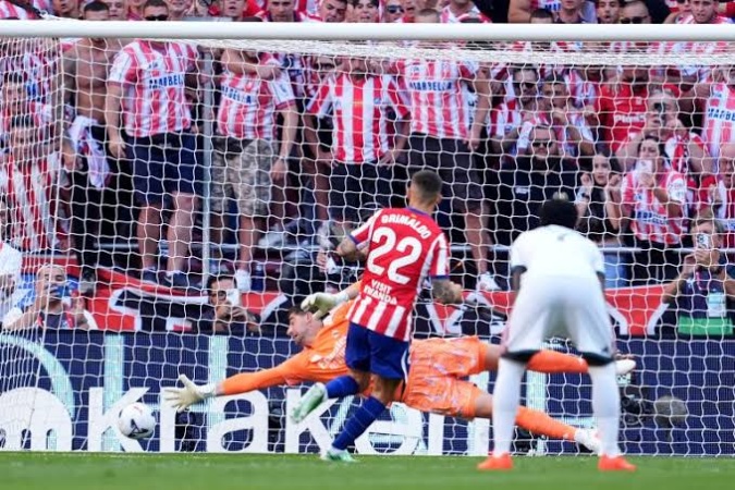 Atletico beat 10-man Real in feisty Madrid derby