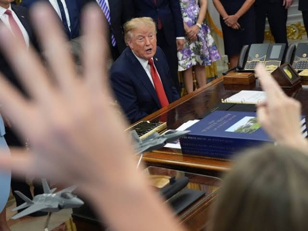 Trump’s press ban prompts widespread solidarity — and fewer images of the president