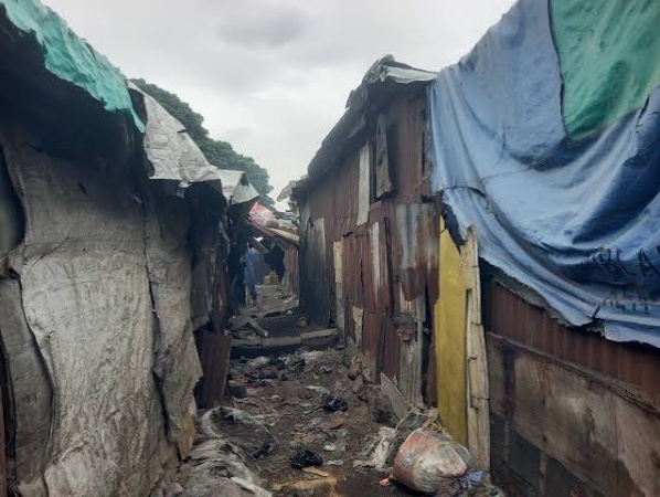 Billboard tenants: The invisible Lagosians who sleep, give birth, live in the open