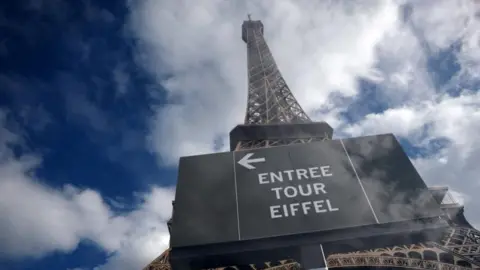 Eiffel Tower shut by staff protest after female workers moved for religious visit