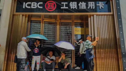 China to pump $54bn into state banks and insurers to boost economy