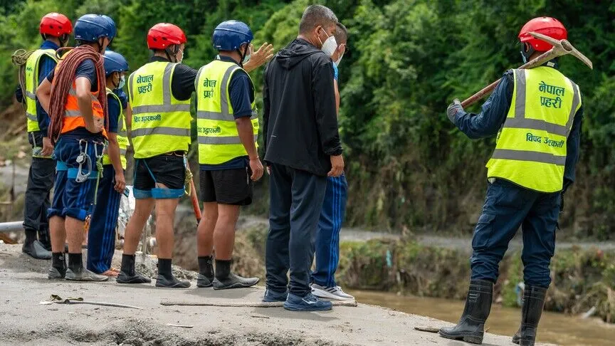 Rescuers pull 2 people alive from tunnel more than week after flash floods in Nepal