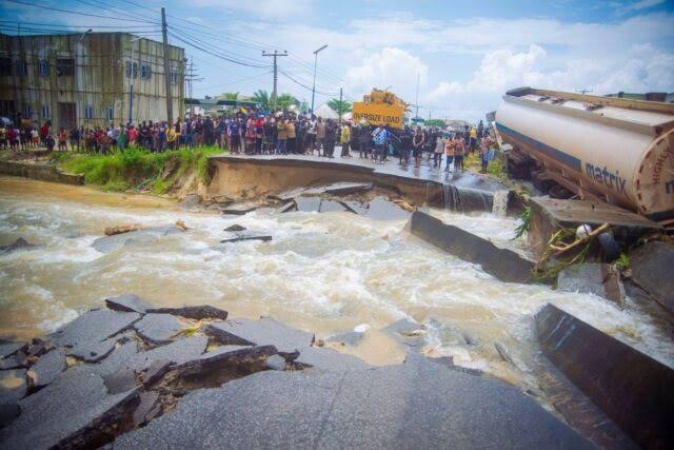 Flash floods damages section of East-West Road, Delta residents seek urgent intervention