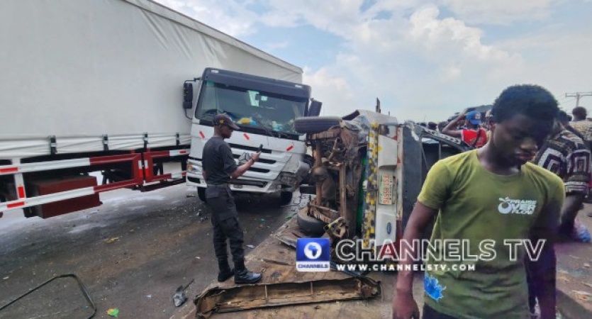 PHOTOS: Five injured as truck rams into buses at Berger Bus Stop in Lagos