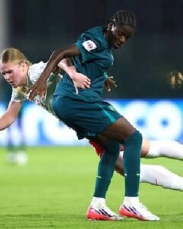 Flamingos fall 2-1 to Poland in World Cup opener