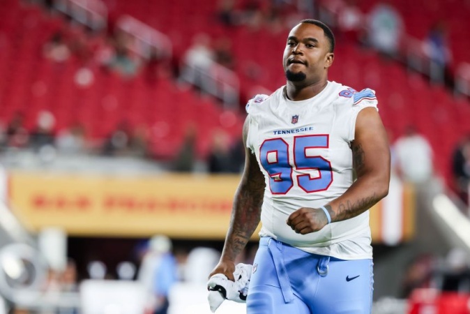 Player released by Titans after pulling out gun in parking lot, coach says