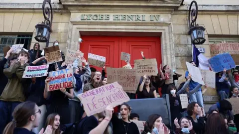 Mass school protests begin in France after days of clashes