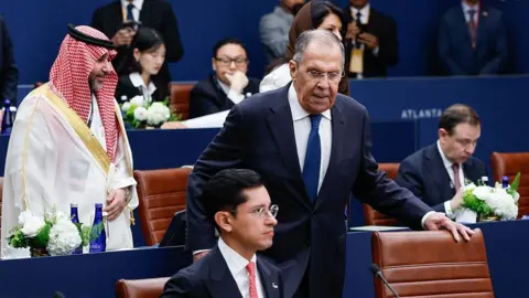 G20 'family photo' cancelled after protests over presence of Russian minister